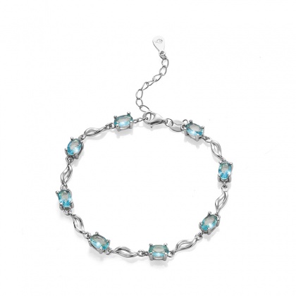 Сребърна гривна със сини камъни