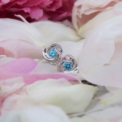 Сребърни обеци рози със син цирконий